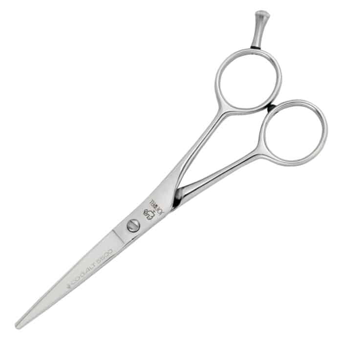 A pair of sleek, silver Joewell scissors with sharp, pointed blades and ergonomic finger holes, designed for precise cutting.